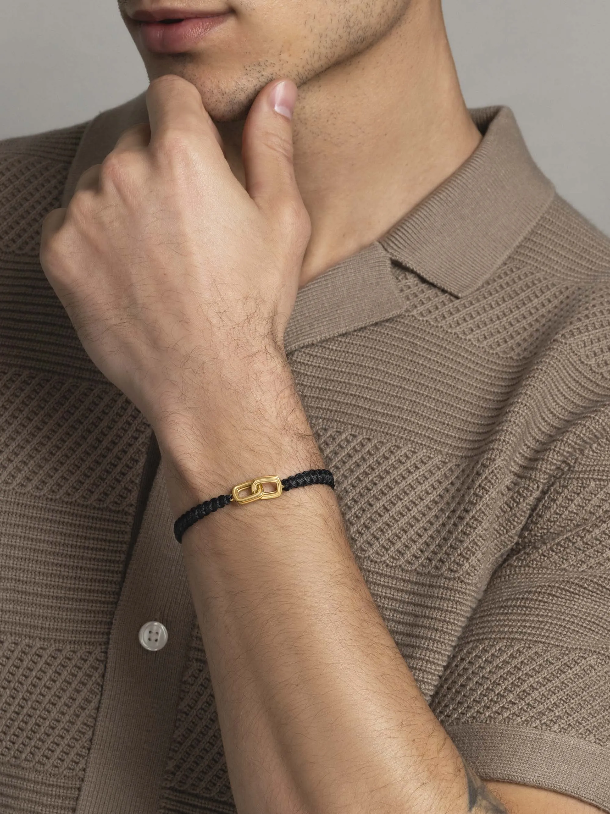 Men's Black String Bracelet with Gold Interlocking Rings