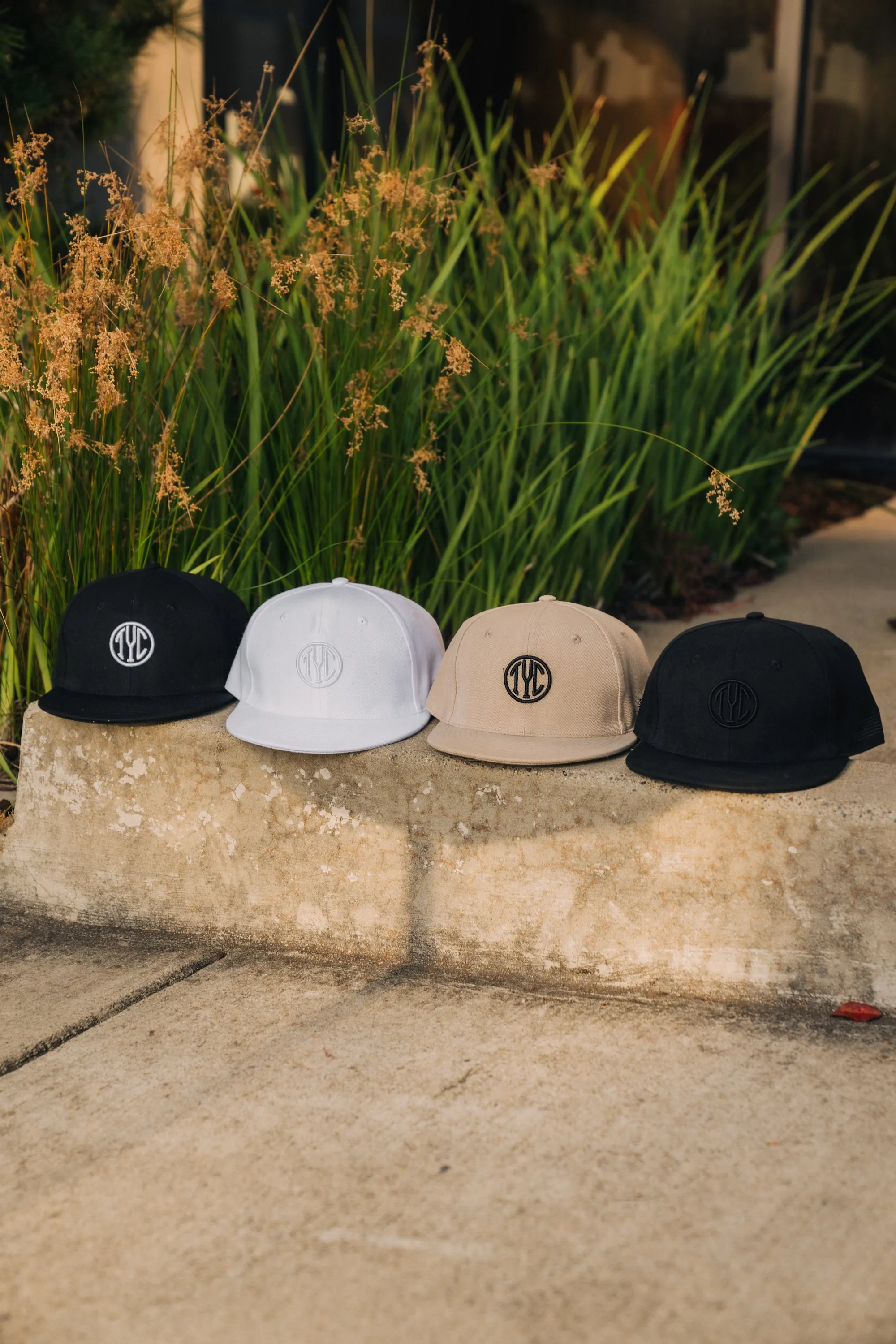 TYC Logo Snapback Hats