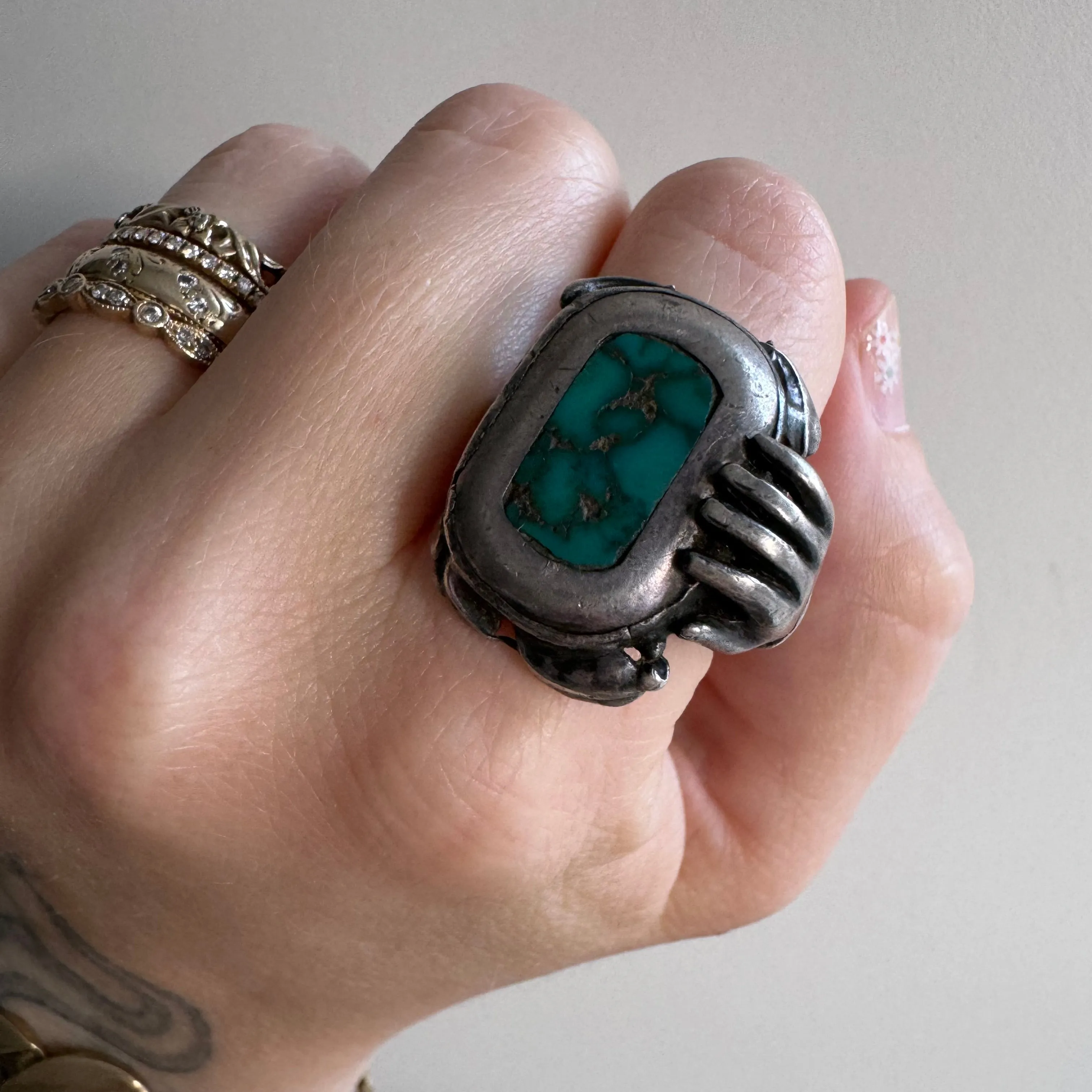 V I N T A G E // mano and magic / sterling silver arts and crafts turquoise and figural hand ring / size 7.75